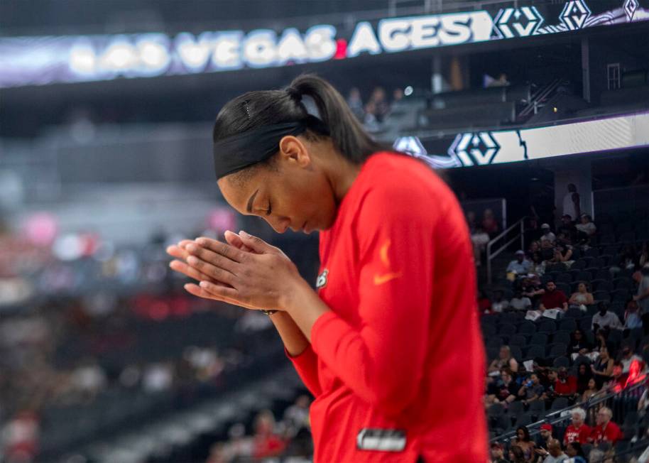 Las Vegas Aces forward A'ja Wilson prays before Game 1 of a WNBA basketball playoff series agai ...