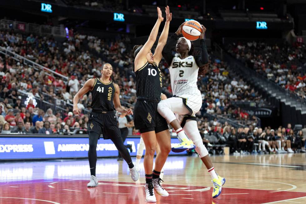 Chicago Sky guard Kahleah Copper (2) shoots while Las Vegas Aces guard Kelsey Plum (10) defends ...