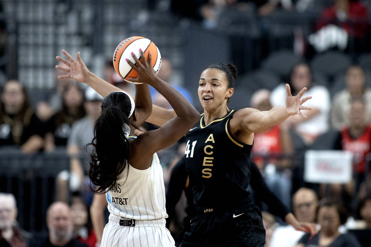 Las Vegas Aces center Kiah Stokes (41) guards Chicago Sky guard Dana Evans (11) during the firs ...