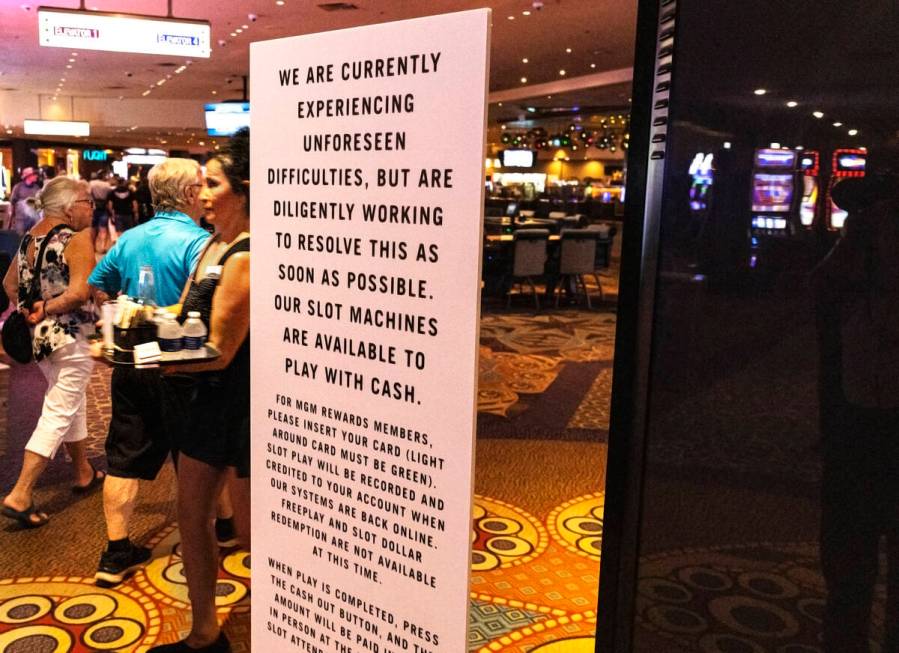 A sign warns guests of difficulties with gambling machines following a hack targeted at MGM Res ...