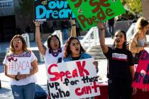 UNLV students hold up signs during a rally in support of DACA recipients at UNLV in Las Vegas o ...