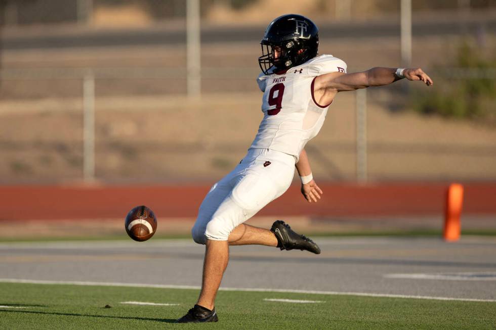 Faith Lutheran kicker Caden Chittenden (9) begins a kickoff during the first half of a high sch ...