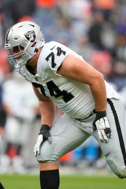 Las Vegas Raiders offensive tackle Kolton Miller (74) lines up against the Denver Broncos uring ...