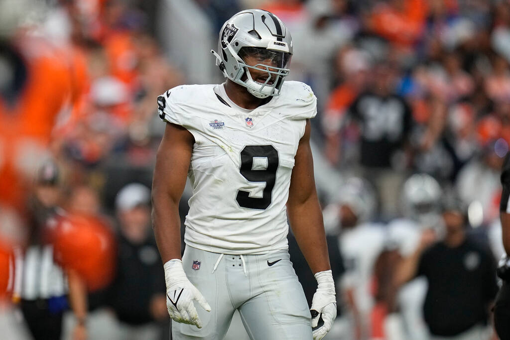 Las Vegas Raiders defensive end Tyree Wilson (9) looks on against the Denver Broncos during an ...