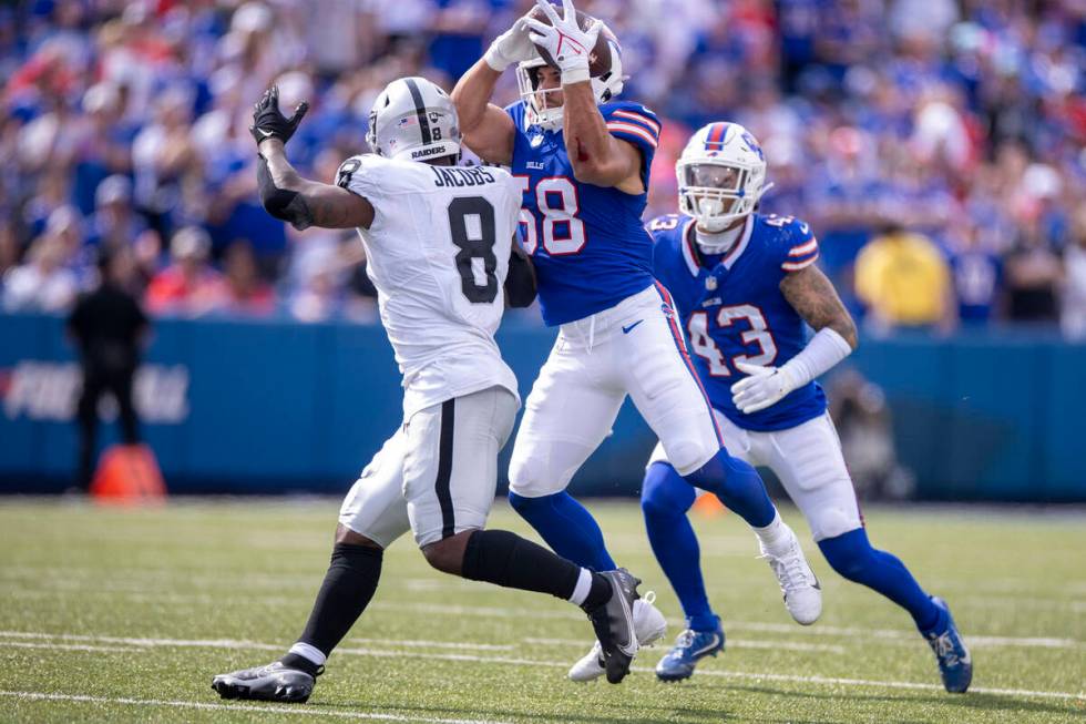 Buffalo Bills linebacker Matt Milano (58) intercepts a pass intended for Raiders running back J ...