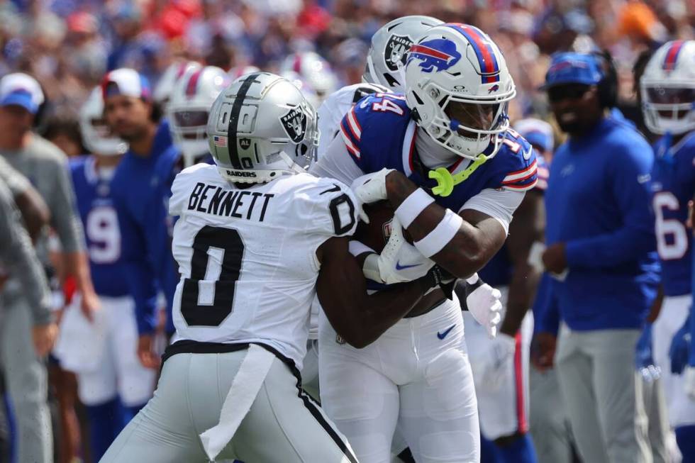 Las Vegas Raiders' Jakorian Bennett (0) forces Buffalo Bills' Stefon Diggs (14) out of bounds d ...