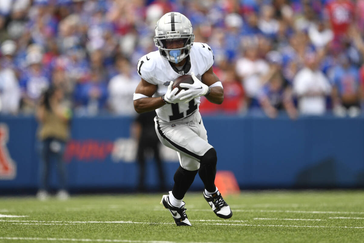 Las Vegas Raiders wide receiver Tre Tucker (11) runs during the first half of an NFL football g ...