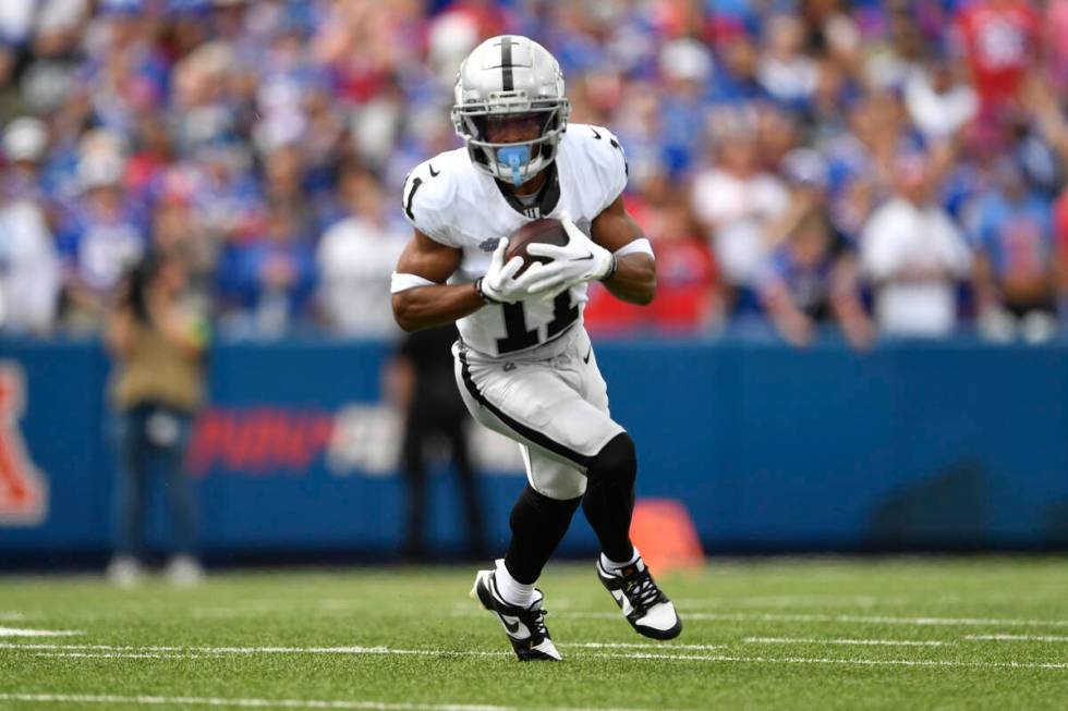 Las Vegas Raiders wide receiver Tre Tucker (11) runs during the first half of an NFL football g ...