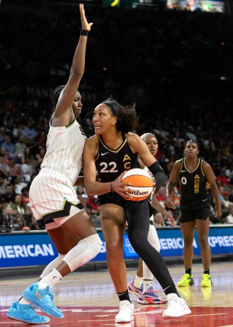 Las Vegas Aces forward A'ja Wilson (22) shoots against Chicago Sky center Elizabeth Williams (1 ...