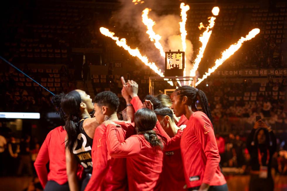 The Las Vegas Aces gather after their starting lineup is announced before Game 2 in a first-rou ...