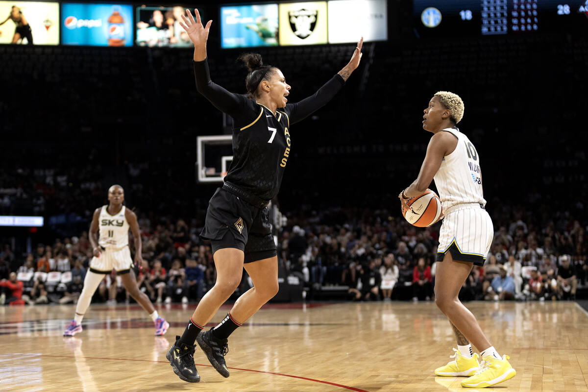 Las Vegas Aces forward Alysha Clark (7) defends against Chicago Sky guard Courtney Williams (10 ...