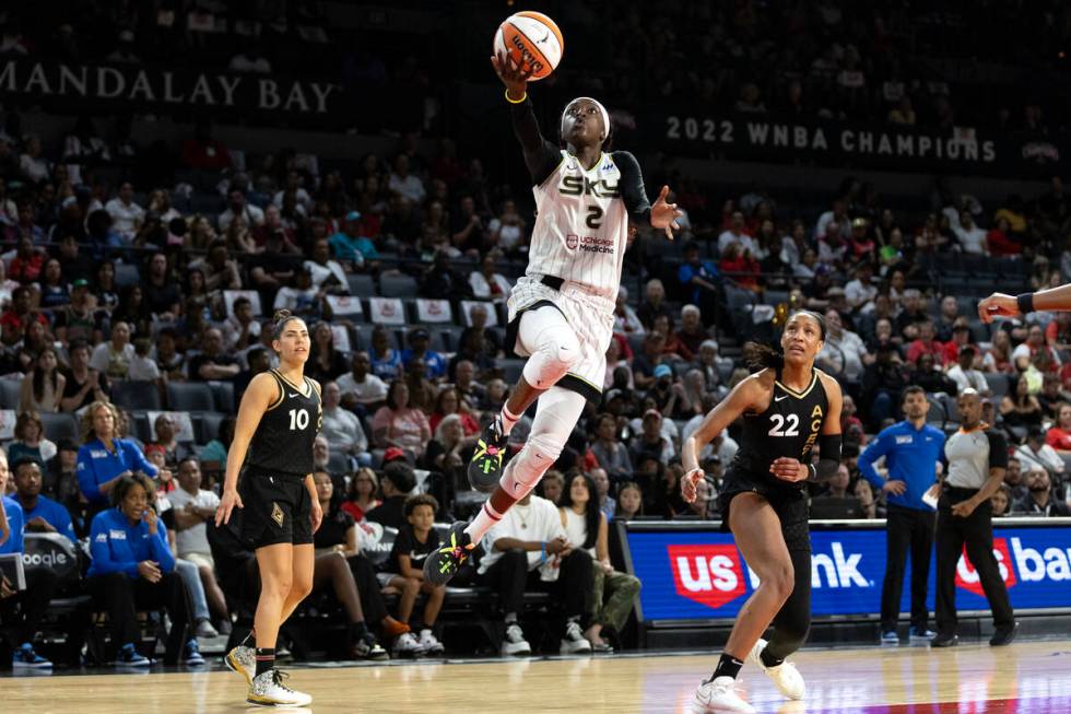 Chicago Sky guard Kahleah Copper (2) jumps for a shot while Las Vegas Aces guard Kelsey Plum (1 ...