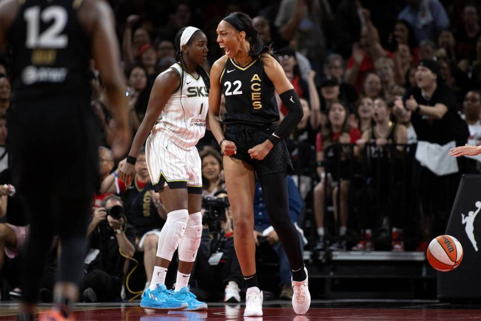 Las Vegas Aces forward A'ja Wilson (22) celebrates a block over Chicago Sky center Elizabeth Wi ...