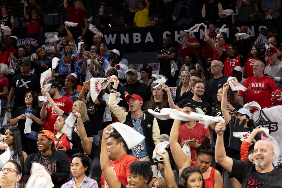 Las Vegas Aces fans wave their playoff towels during the second half of Game 2 in a first-round ...