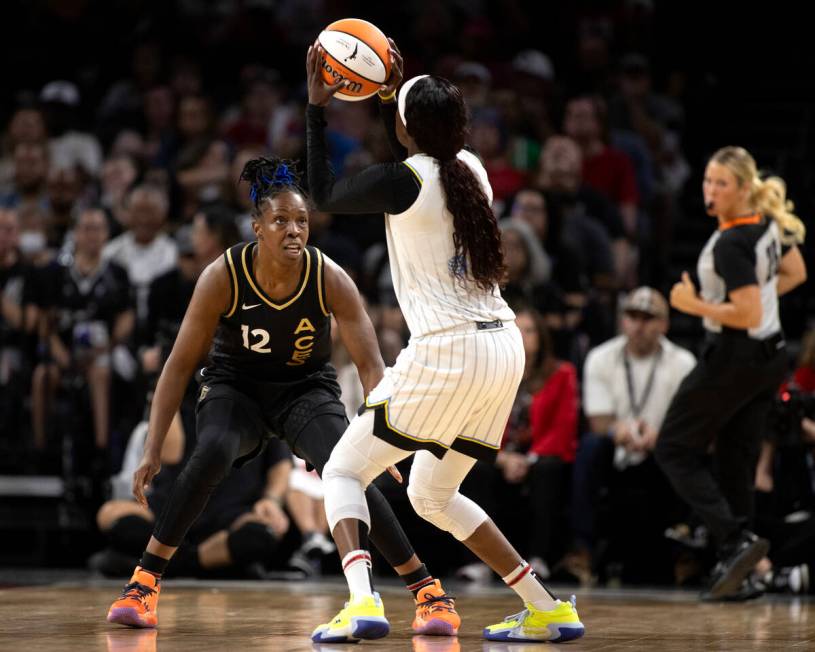 Las Vegas Aces guard Chelsea Gray (12) defends against Chicago Sky guard Kahleah Copper (2) dur ...