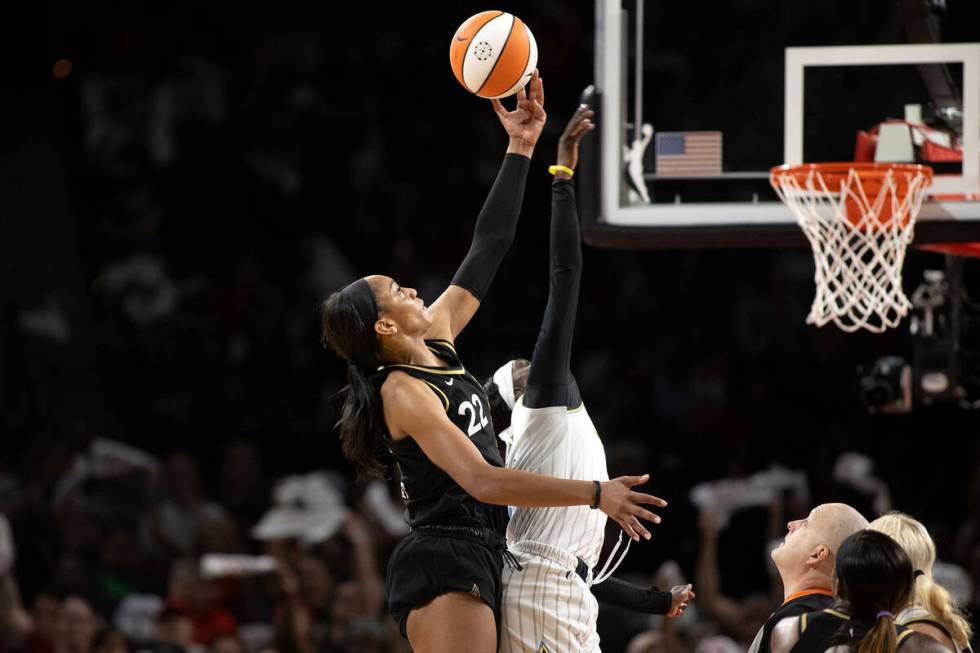 Las Vegas Aces forward A'ja Wilson (22) tips the ball away from Chicago Sky guard Kahleah Coppe ...