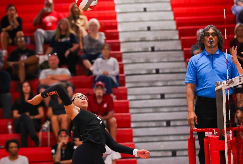 Liberty’s Jayda Hutchins (7) prepares to spike the ball during a volleyball game between ...