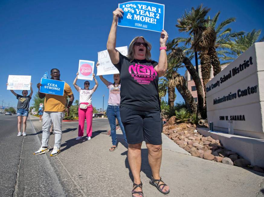 From left, Christa Pryor, Ender Austin III, Stephanie Valdez, Kilee Kent and Jeri Burton hold s ...