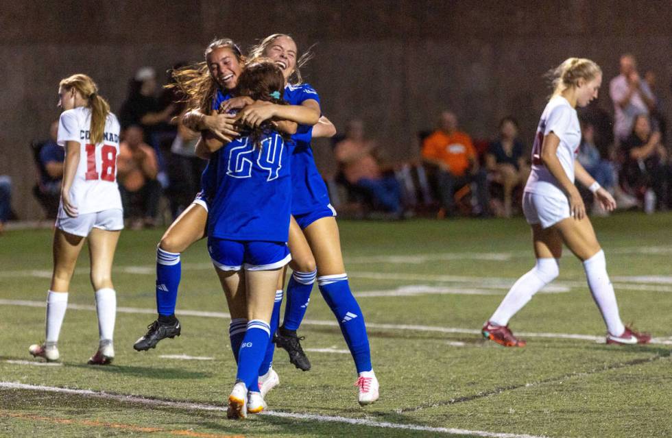 Bishop Gorman forward Hunter Borgel (24) celebrates a goal with teammates against Coronado duri ...