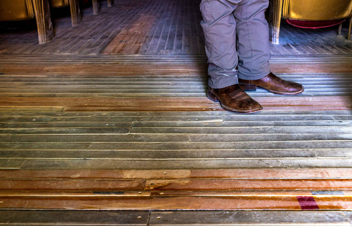 Recycled basketball court wood slats replace those damaged in the Amargosa Opera House after su ...