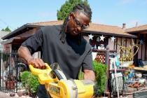 Raiders All-Pro wide receiver Davante Adams trades his football for a sledgehammer as he gifts ...