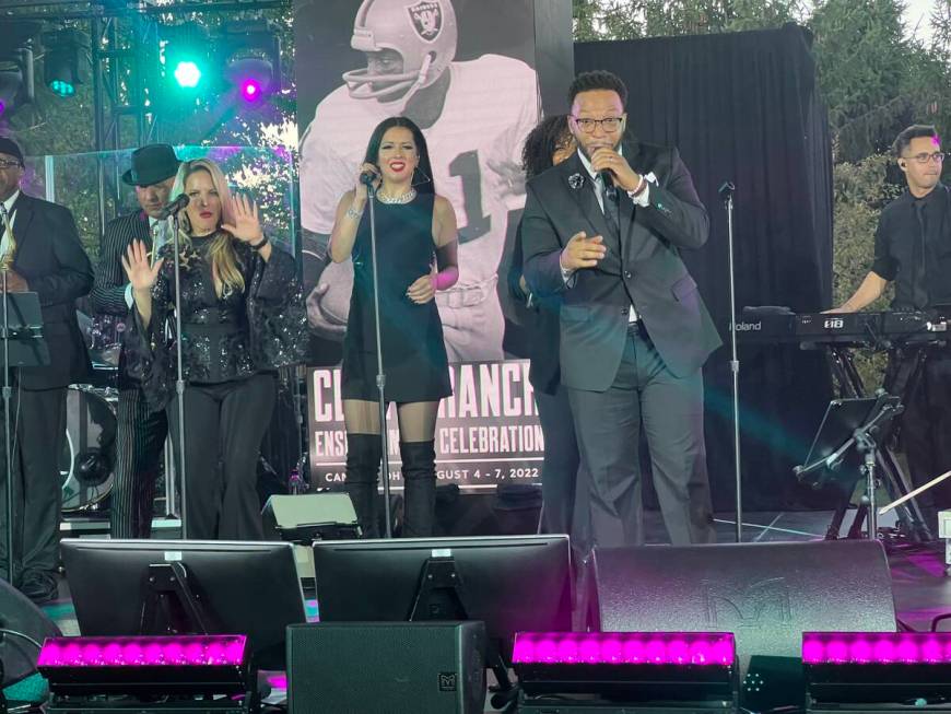 Lily Arce, Rockie Brown and Fletch Walcott are shown the Raiders' party honoring Cliff Branch a ...