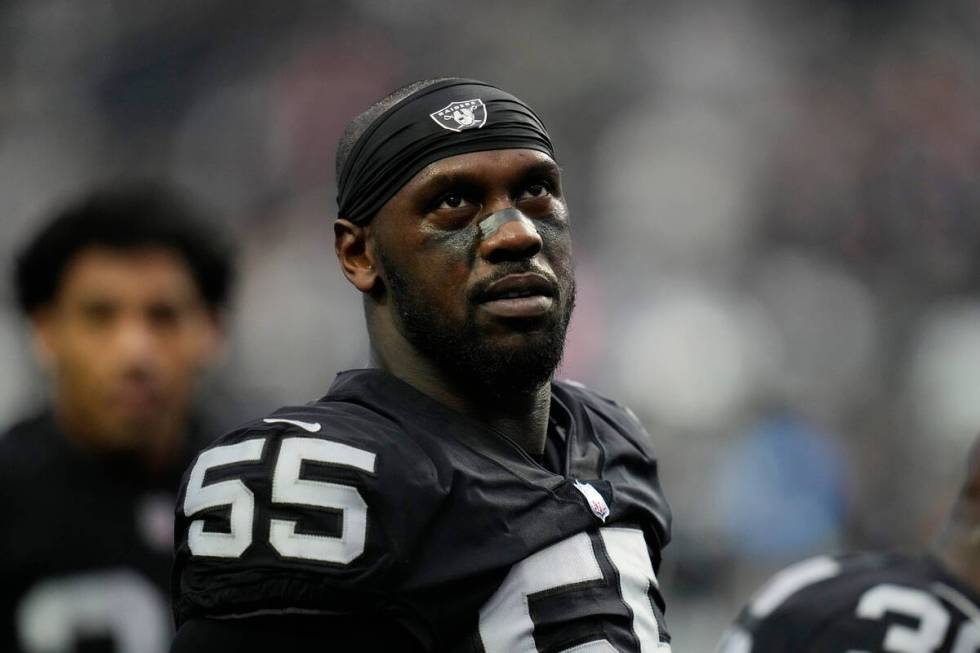 Las Vegas Raiders defensive end Chandler Jones warms up before an NFL game against the New Engl ...