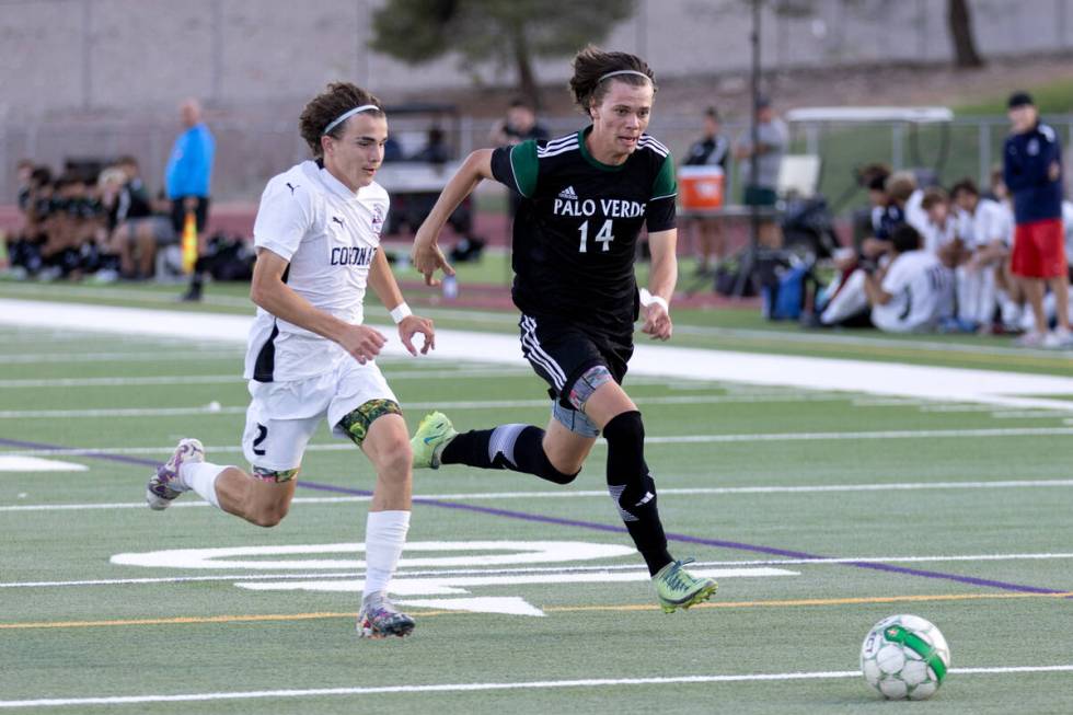 Coronado’s Brody Breeden (2) and Palo Verde’s Evan Odle (14) race for the ball du ...