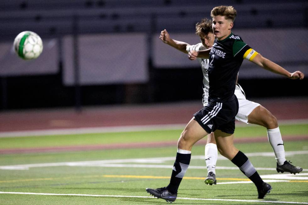 Coronado’s Silvestre Cahue, behind, attempts a gaol against Palo Verde’s Preston ...