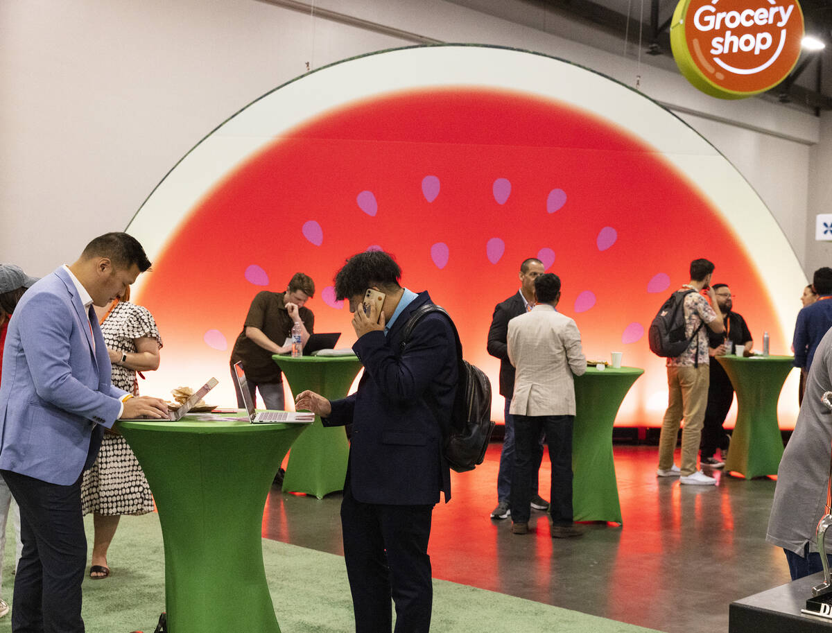 Conventioners work at Grocery Convention at Mandalay Bay Convention Center, on Wednesday, Sept. ...