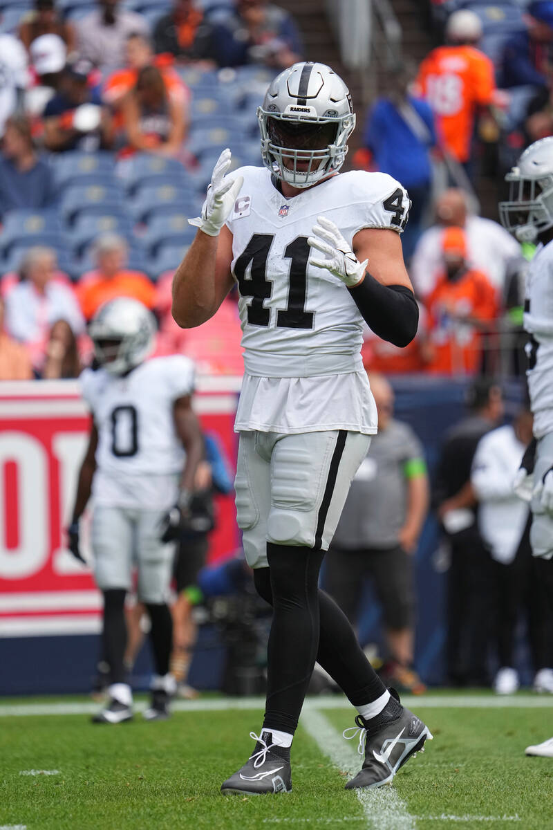 Las Vegas Raiders linebacker Robert Spillane (41) plays against the Denver Broncos of an NFL fo ...