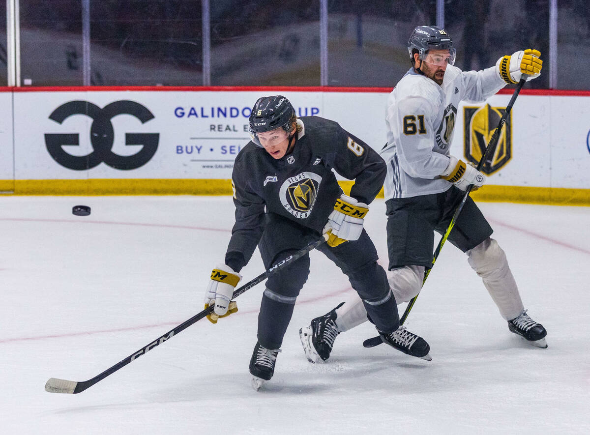 Golden Knights defenseman Kaedan Korczak (6) deflects a puck away from right wing Mark Stone (6 ...