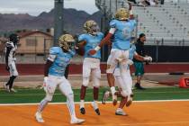 Foothill players celebrate a touchdown by wide receiver Chase Kennedy (5) during a game against ...