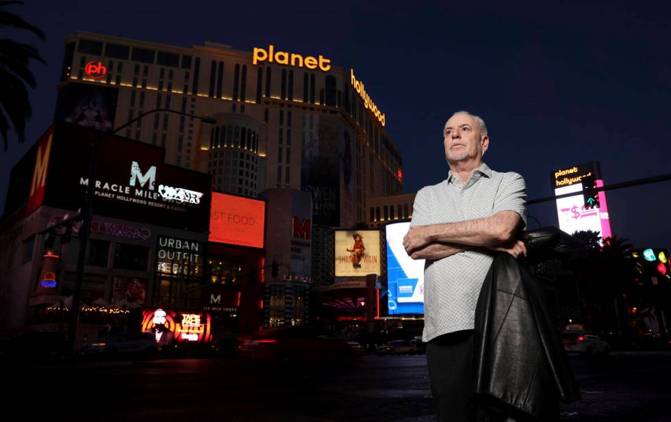 Jeff German, host of "Mobbed Up," poses with Planet Hollywood, formerly the Aladdin, in the bac ...