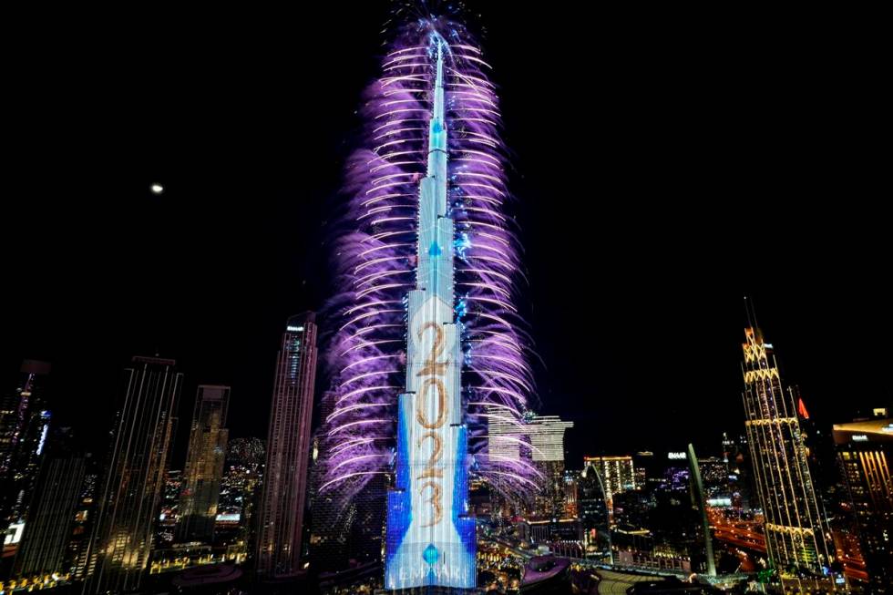 Fireworks explode at the Burj Khalifa, the world's tallest building, during the New Year's Eve ...