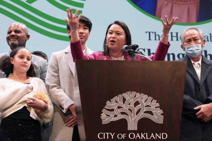 Oakland Mayor Sheng Thao delivers a speech was standing onstage with her family at the Paramoun ...