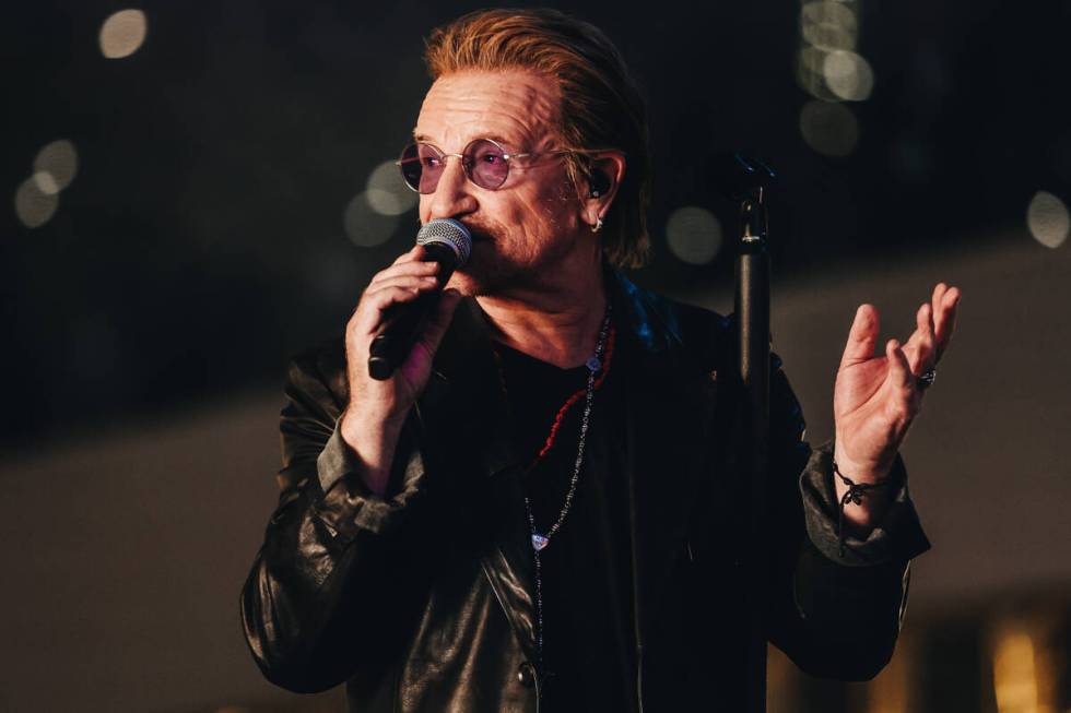 U2 performs while filming a music video in front of the Plaza hotel and casino on Sunday, Sept. ...