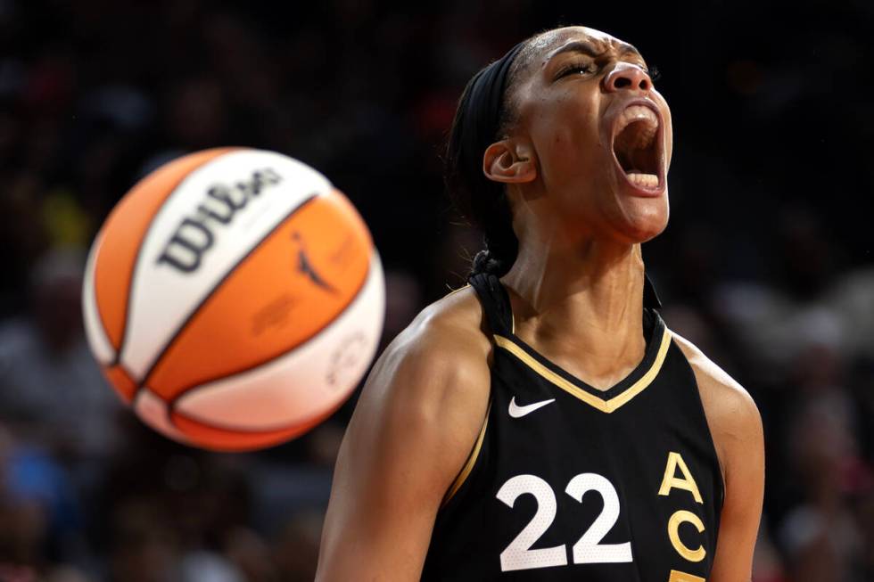 Las Vegas Aces forward A'ja Wilson (22) celebrates after the Dallas Wings fouled her during the ...