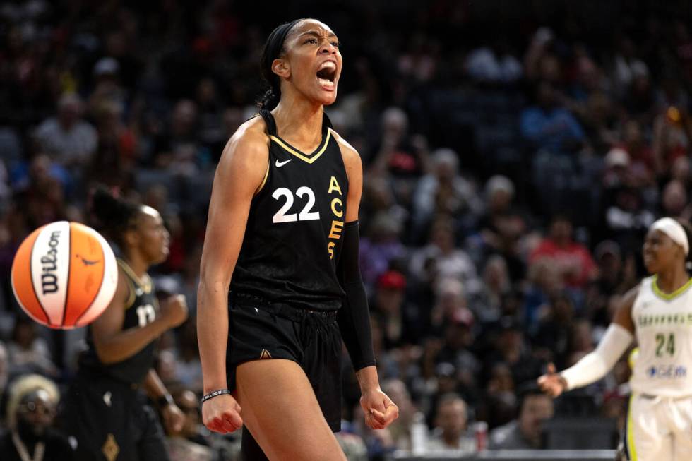 Las Vegas Aces forward A'ja Wilson (22) celebrates after referees gave the Dallas Wings a foul ...