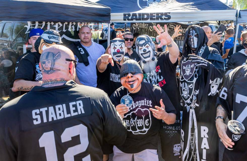 Raiders fans get pumped up during tailgating before the first half of the Raiders versus Pittsb ...