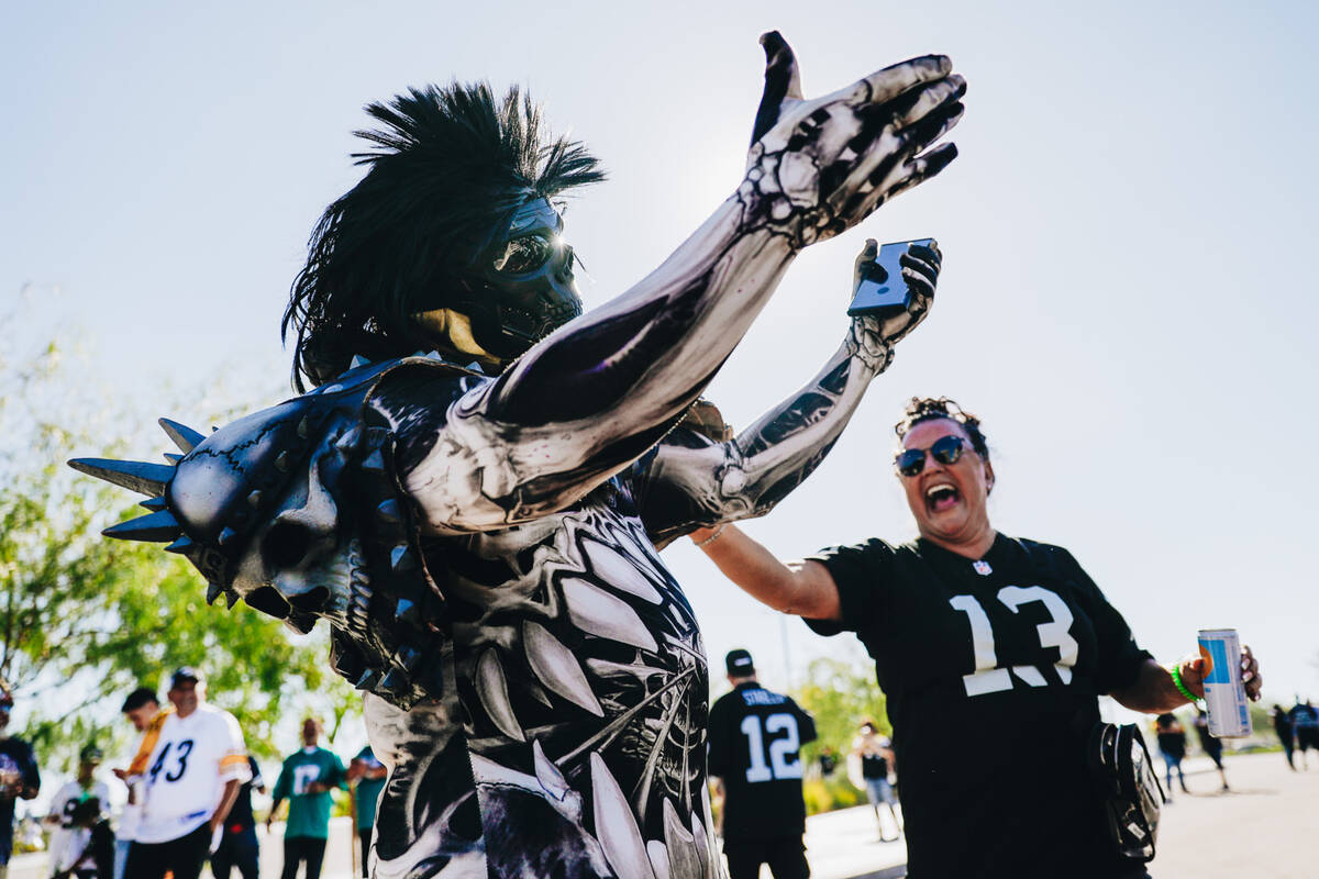 Robert Lee, a lifelong Raiders fan, dances at a tailgate before a Raiders game against the Pitt ...