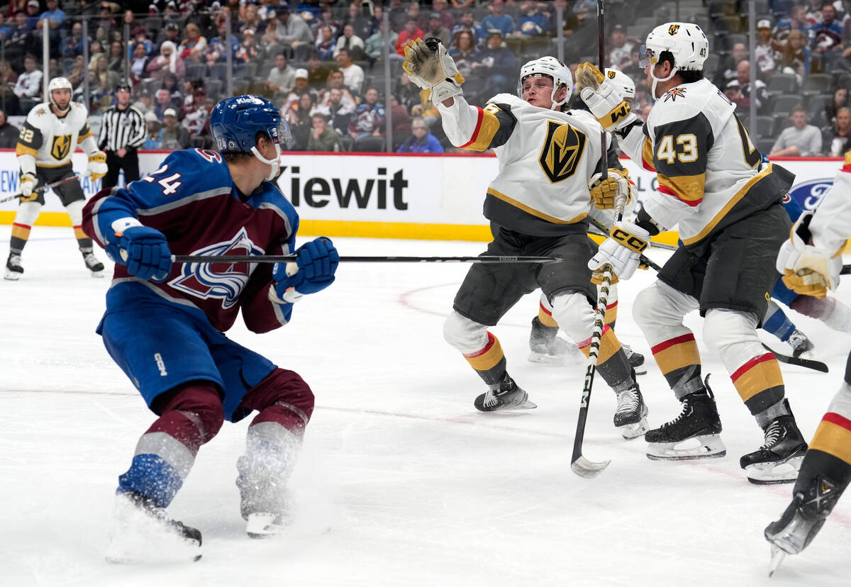 Vegas Golden Knights right wing Sheldon Rempal, center, catches a flying puck as center Paul Co ...