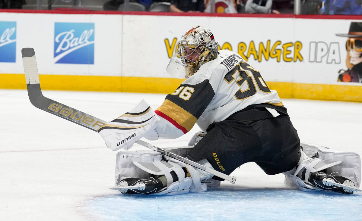 Vegas Golden Knights goalie Logan Thompson looks for a shot by the Colorado Avalanche in the fi ...