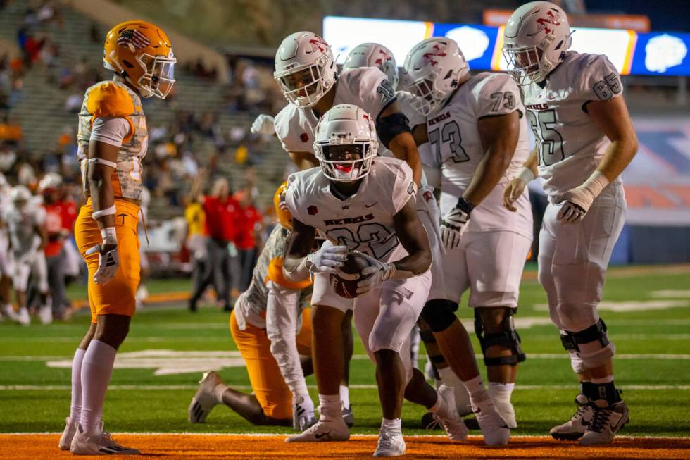 UNLV running back Jai'Den Thomas (22) scores his fourth touchdown against UTEP during the secon ...