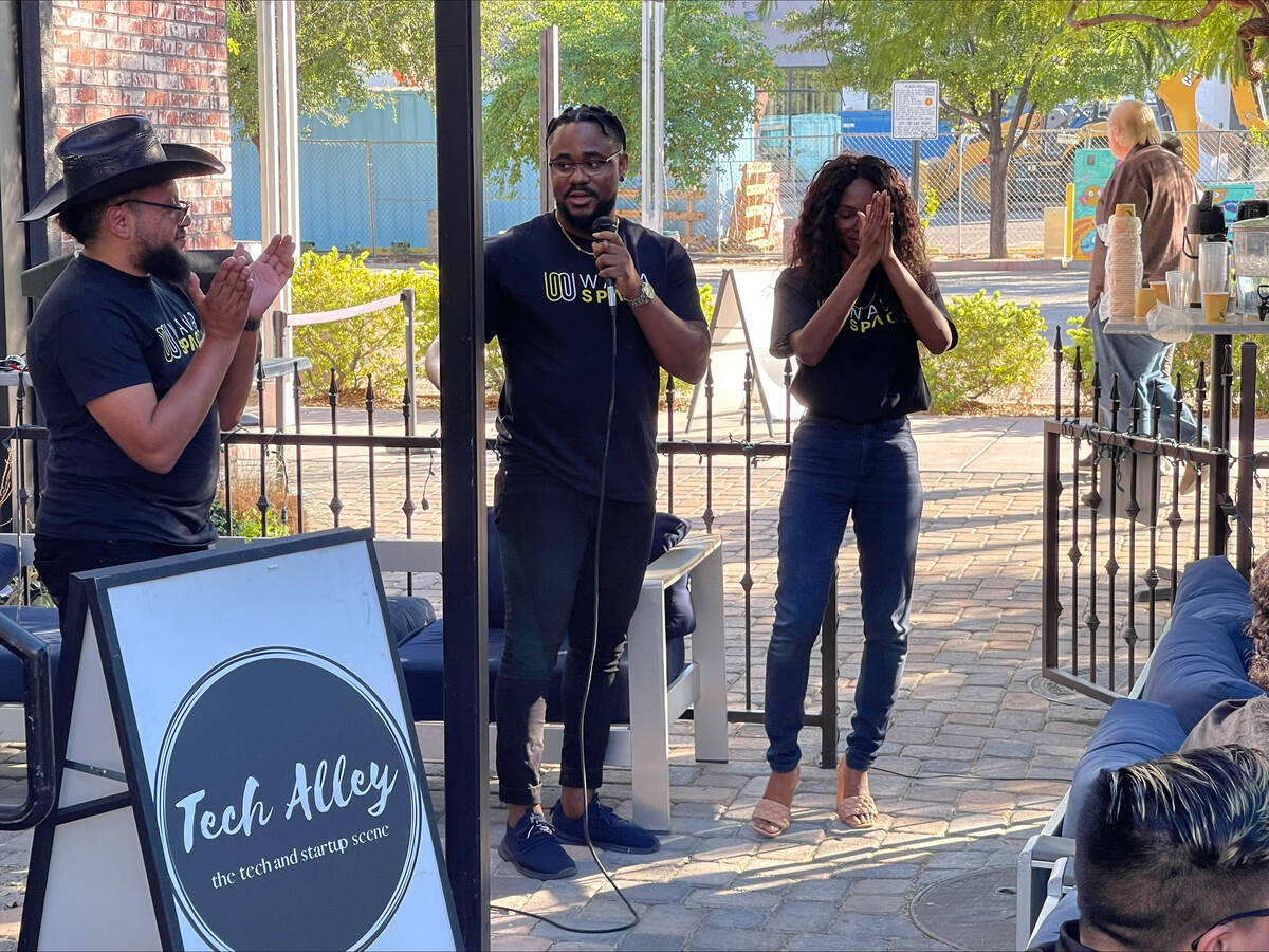 Valentine Aikhu (middle), WavaSpace co-founder and CEO, talking at a startup community event on ...