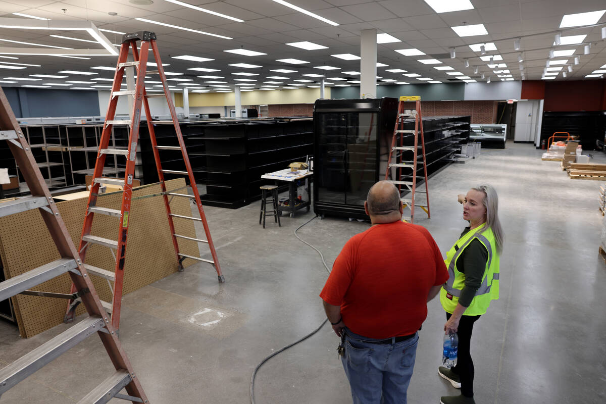 Owner and namesake Mario Berlanga and Construction Project Manager Jennifer Hawkes check on pro ...