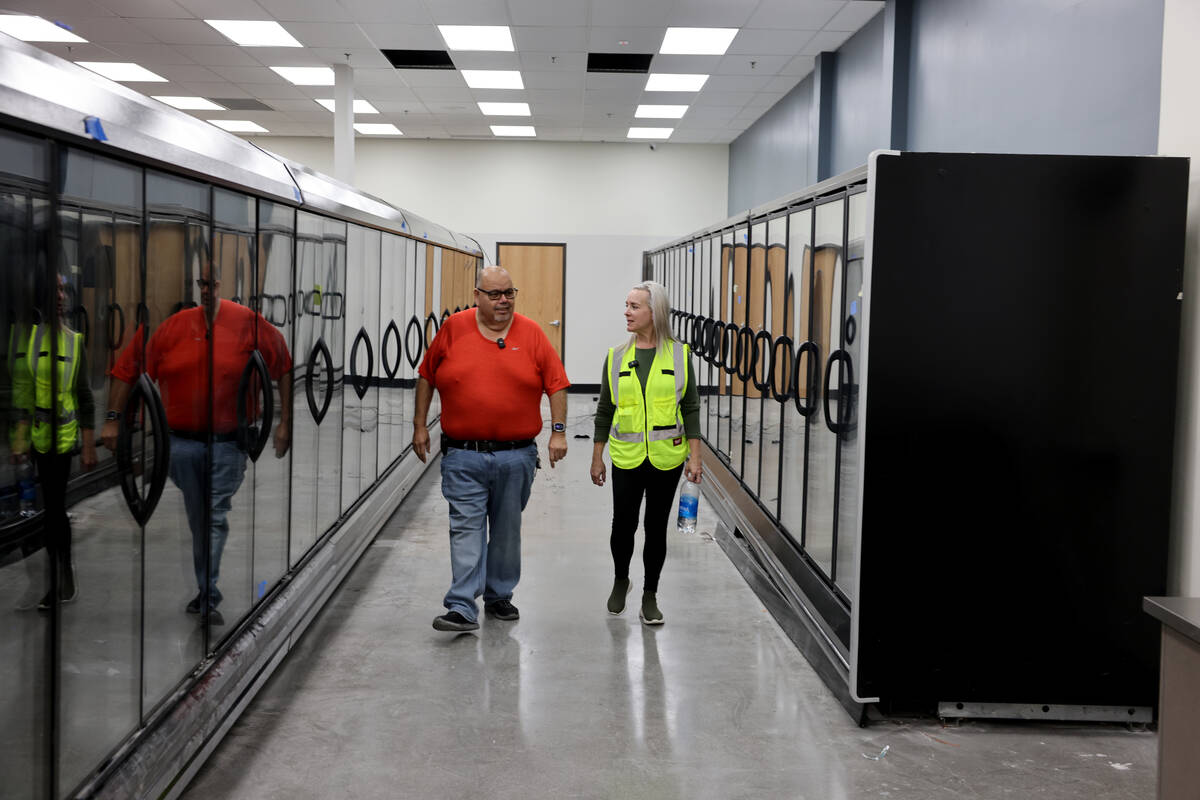 Owner and namesake Mario Berlanga and Construction Project Manager Jennifer Hawkes check on pro ...