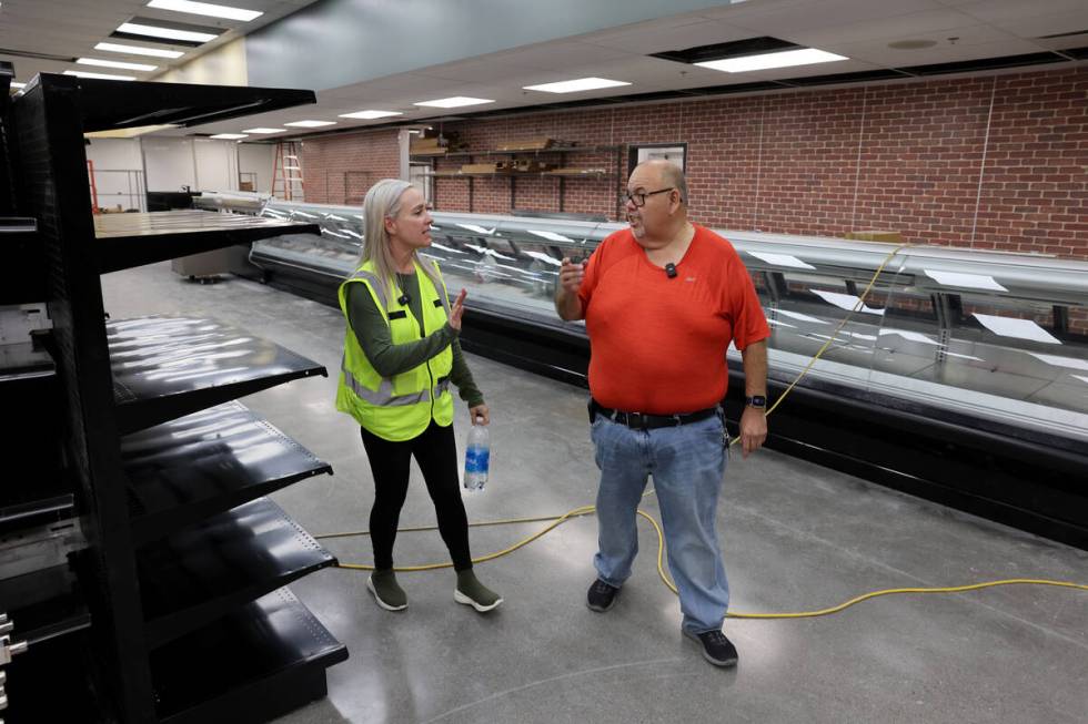 Owner and namesake Mario Berlanga and Construction Project Manager Jennifer Hawkes check on pro ...