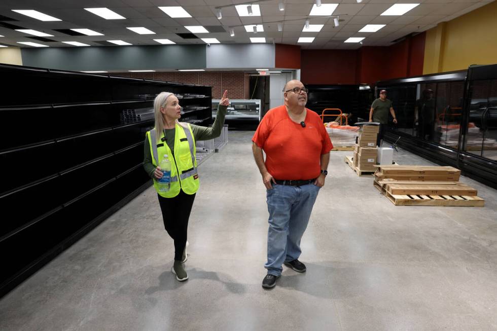 Owner and namesake Mario Berlanga and Construction Project Manager Jennifer Hawkes check on pro ...