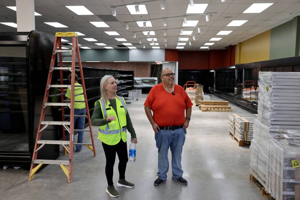 Owner and namesake Mario Berlanga and Construction Project Manager Jennifer Hawkes check on pro ...